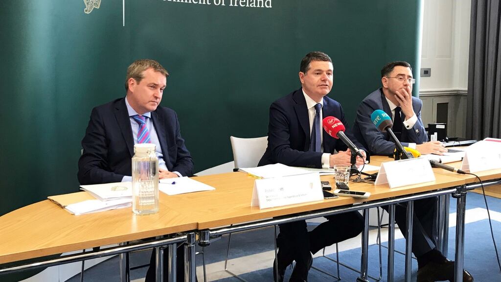 Department of Public Expenditure and Reform secretary general Robert Watt; Minister for Finance Paschal Donohoe; and John McCarthy, the department’s chief economist at the launch of the Government’s Summer Economic Statement. Photograph: Michelle Devane/PA