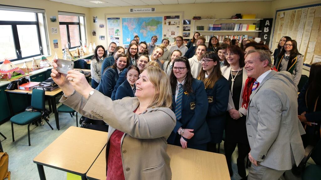 Northern Ireland Secretary Karen Bradley taking a selfie with pupils and staff during a visit to Thornhill College Derry. Photograph: Kelvin Boyes/Press Eye/PA Wire