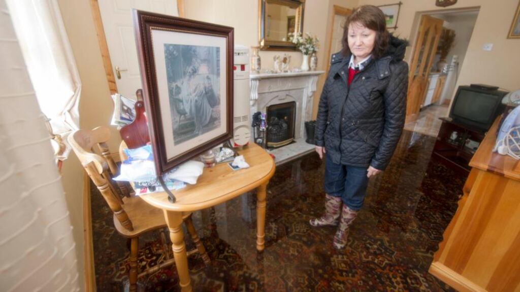 Catherine Quirke in her flooded home near Rathcormac, Co Cork. Photograph: Michael Mac Sweeney/Provision