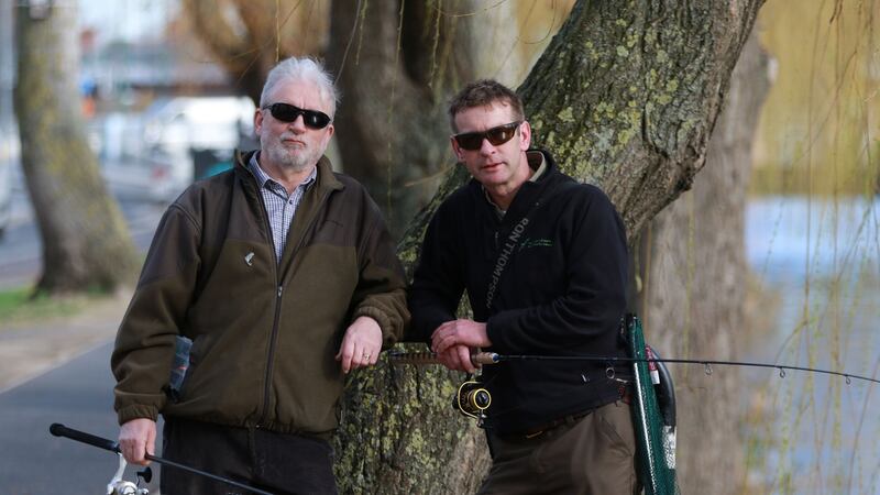 Ciaran Ward, project co-ordinator of CBS James Street angling programme, and Des Chew, assistant inspector of Inland Fisheries Ireland on the canal. Photograph: Nick Bradshaw