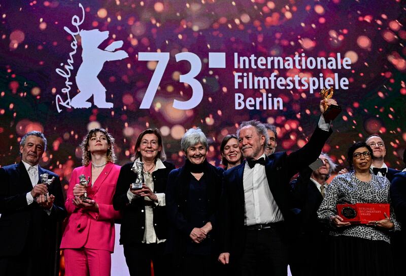 French director Nicolas Philibert poses with the Golden Bear for Best Film in front of other laureates after the award ceremony of the 73rd Berlinale International Film Festival in Berlin, on February 25th, 2023. Photograph: John MacDougall/AFP