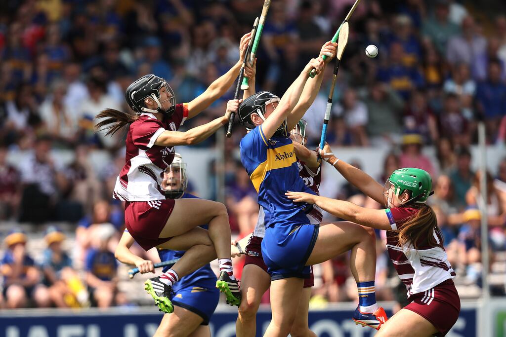 Galway's Carrie Dolan and Mairead Eviston of Tipperary contest the ball during the Glen Dimplex All-Ireland senior camogie championship semi-Final at UPMC Nowlan Park in Kilkenny. Photograph: Bryan Keane/Inpho