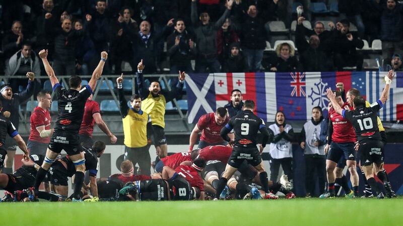 Castres celebrate Paea Fa’anuna’s first-half try against Munster. Photograph: Billy Stickland/Inpho