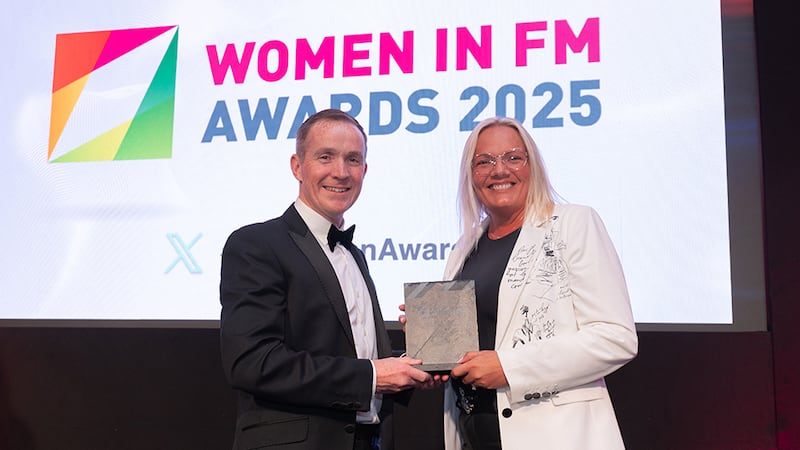 Trevor Smyth, awards judge, presents the best sustainability leadership award to Jodi Artis on behalf of Hayley Egan, Savills