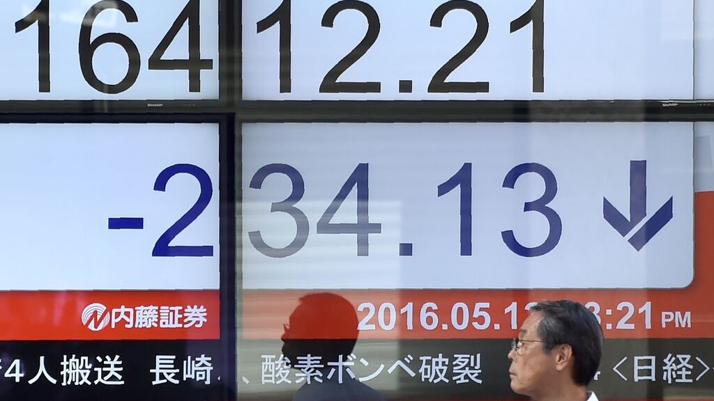Japanese shares and the yen were volatile, with markets digesting surprisingly strong annualised 1.7 per cent growth in the January-March quarter that may be masking pockets of weakness. (Photograph:KAZUHIRO NOGIKAZUHIRO NOGI/AFP/Getty Images)