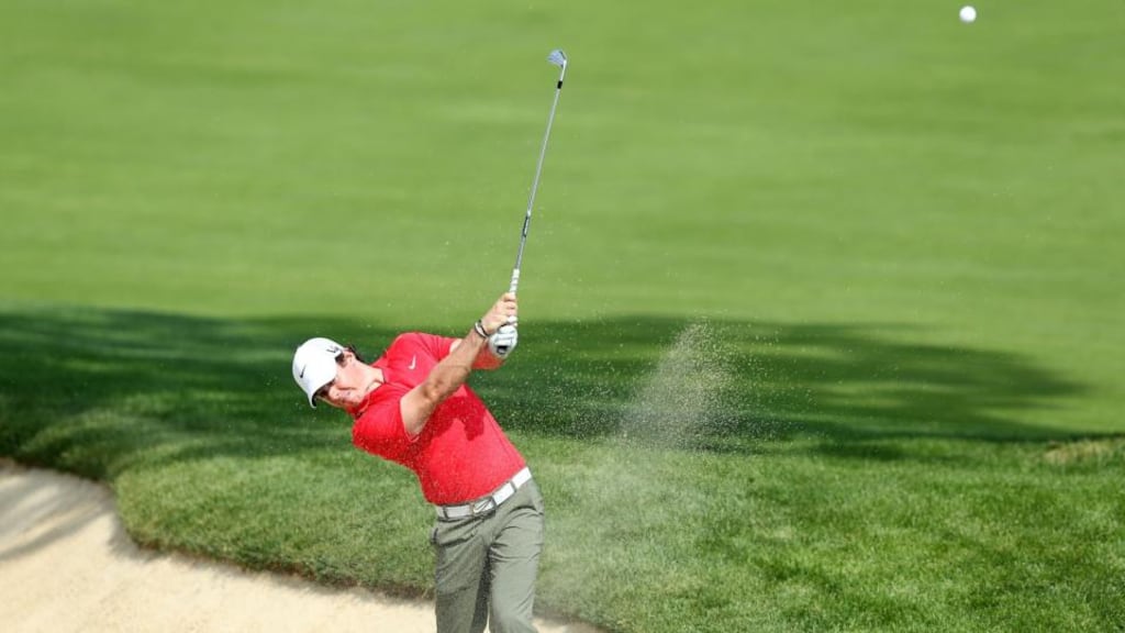Rory McIlroy hits his second shot on the 18th hole during the first round of the Memorial Tournament at Muirfield Village Golf Club in Dublin, Ohio. Photograph: Andy Lyons/Getty Images