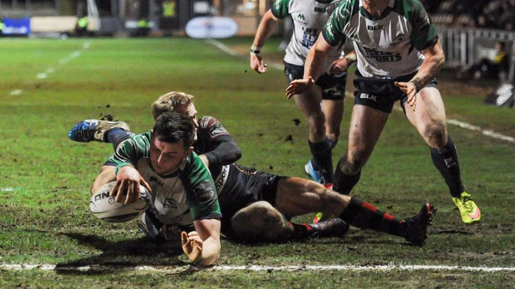 Connacht’s Eoghan Masterson stretches to score his side’s third try during the Guinness Pro 12 game at Rodney Parade. Photograph: Craig Thomas/Inpho