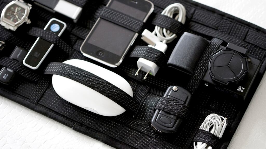 Gadgets, cables, passports, chargers, and toiletries can all find a home.