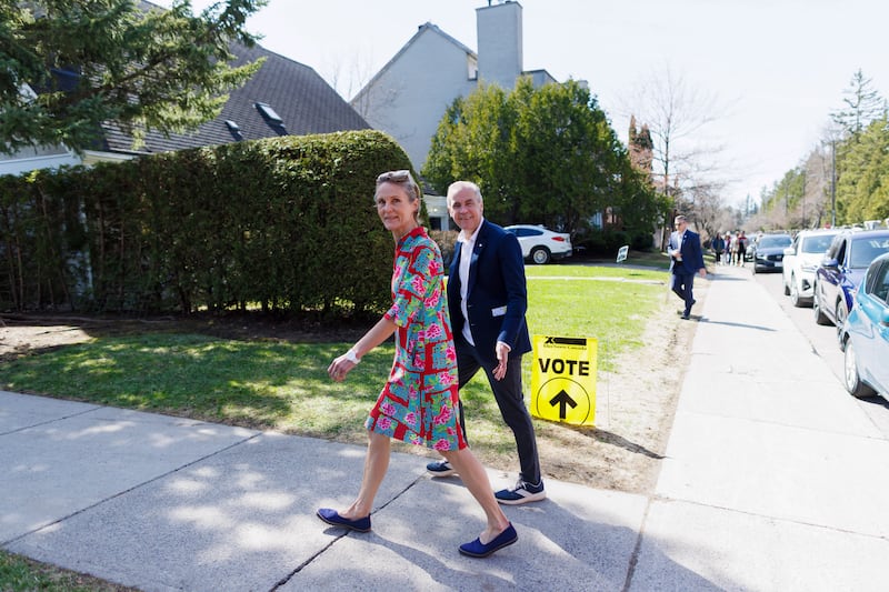 Canada's prime minister Mark Carney, the Liberal Party leader, and his wife, Diana Fox. Photograph: Cole Burston/The New York Times