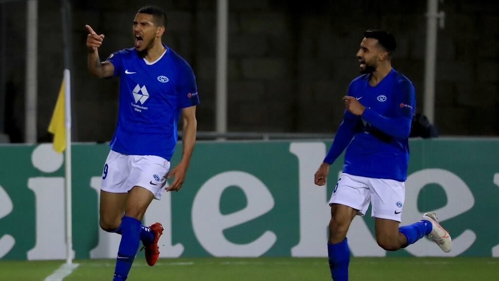 Molde’s Ohi Omoijuanfo (left) celebrates scoring his side’s second goal from the penalty spot during the Uefa Europa League Group B match against Dundalk at Tallaght Stadium. Photograph: Donall Farmer/PA Wire