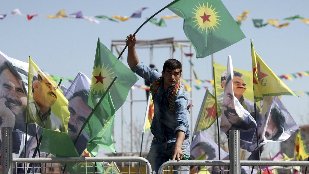 A demonstrator waves a flag of the outlawed Kurdistan Workers Party (PKK) during a gathering to celebrate the spring festival of Newroz in the Kurdish-dominated southeastern city of Diyarbakir, Turkey, earlier in March. File photograph: Sertac Kayar/Reuters