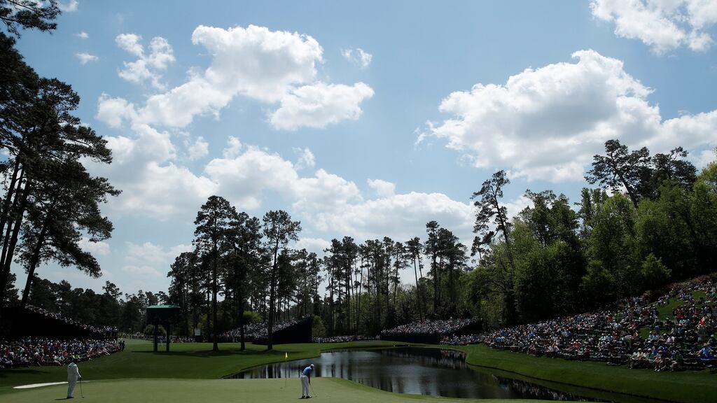 Justin Thomas of the US putts on the 17th green during the second day of practice for the 2018 Masters golf tournament at Augusta National Golf Club. Photto: Mike Segar/Reuters