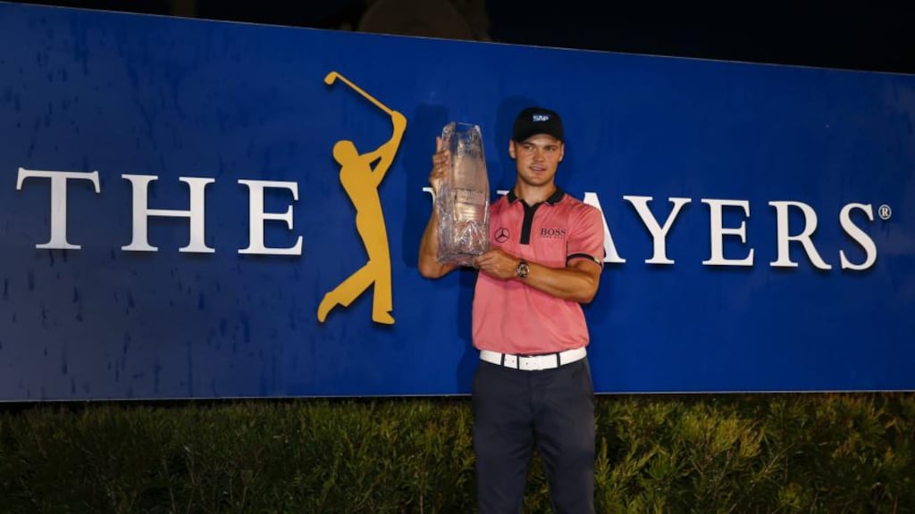 Martin Kaymer holds the winner’s trophy after winning The PLayers Championship at the TPC Sawgrass Stadium course. Photograph: Erik Lesser/EPA