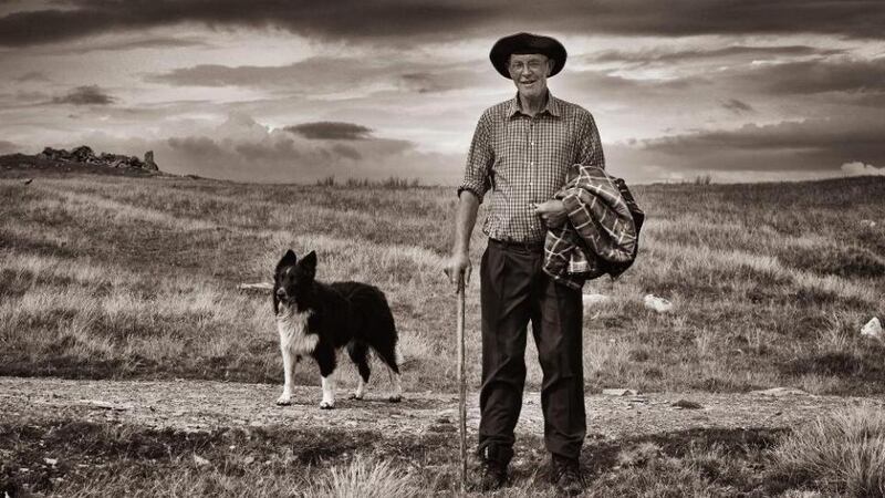 Paddy Joe Heanue with his sheep dog, 'Pup' on Inishturk Island, Co Mayo. Photograph: John Carlos, from his book The Western Islands
