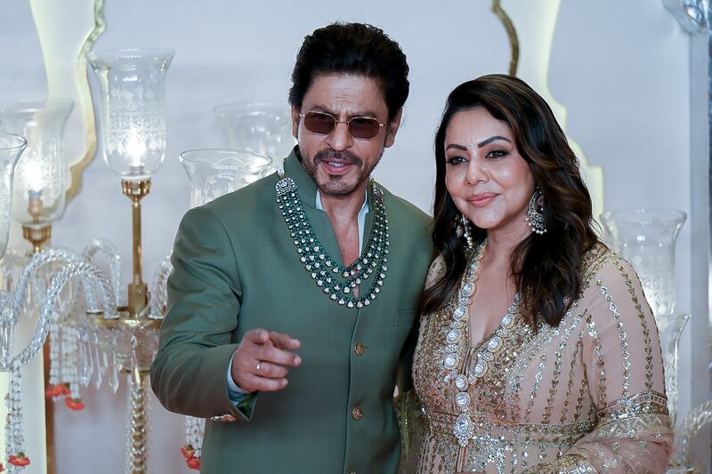 Ambani wedding: Bollywood actor Shah Rukh Khan with his wife Gauri Khan. Photograph: Punit Paranjpepunit Paranjpe/AFP vi Getty Images