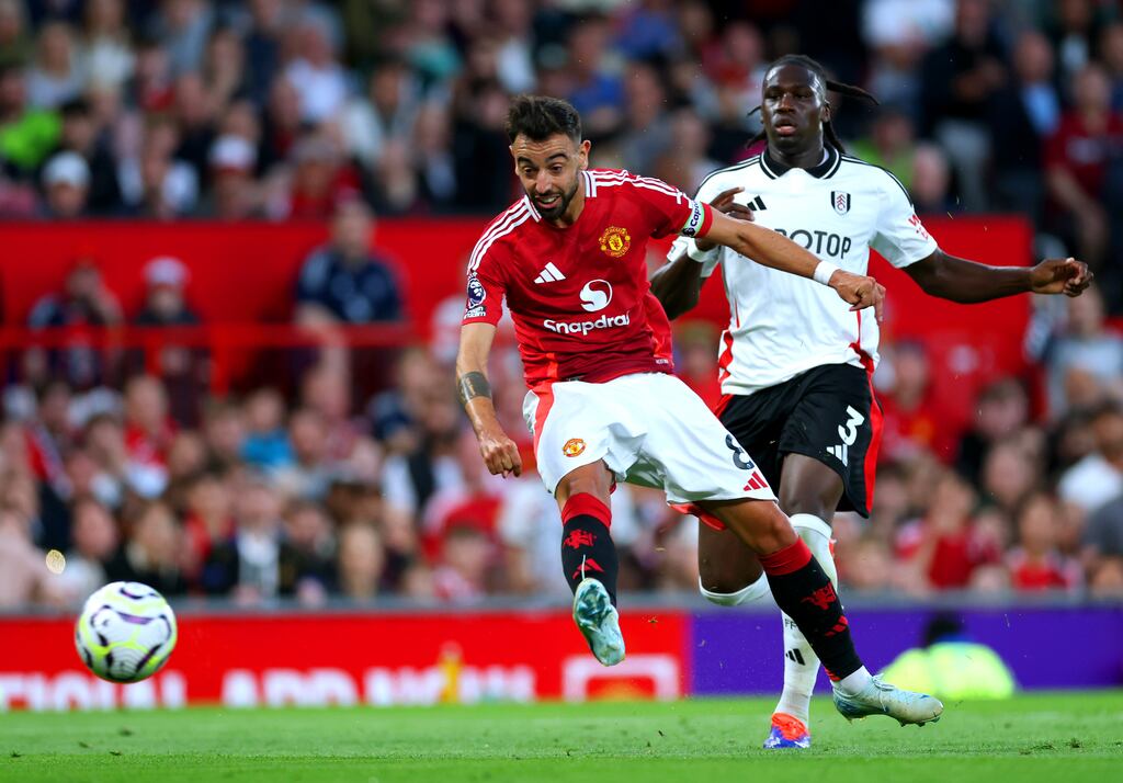 Bruno Fernandes of Manchester United shoots whilst under pressure from Calvin Bassey. Photograph: Carl Recine/Getty