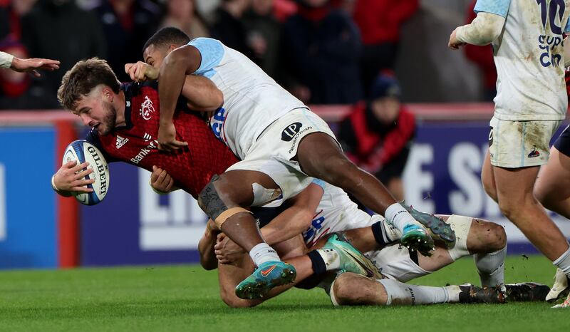 Munster's Alex Nankivell tackled by Cheikh Tiberghien of Bayonne. Photograph: James Crombie/Inpho