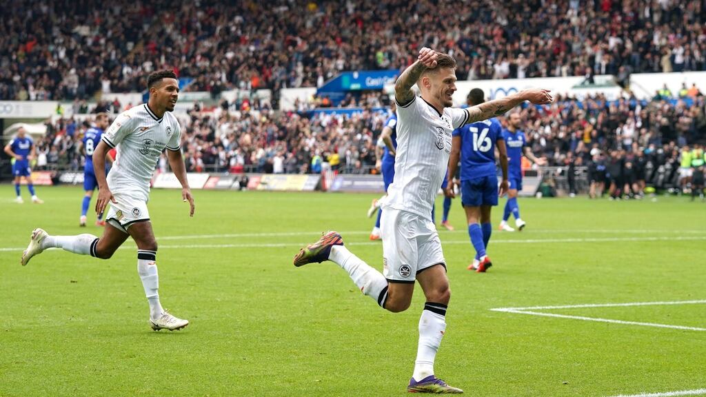 Swansea City’s Jamie Paterson celebrates scoring their side’s first goal of the game during the Championship win over Cardiff at the Swansea.com Stadium. Photo: Nick Potts/PA Wire