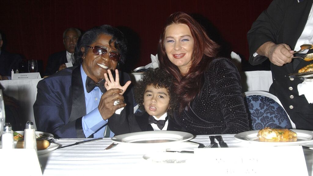 James Brown, son James Brown II and wife Tommy Ray Brown,  at a  gala dinner at the Sheraton Hotel April 6th, 2006 in New York City. Photograph: Arnaldo Magnani/Getty Images