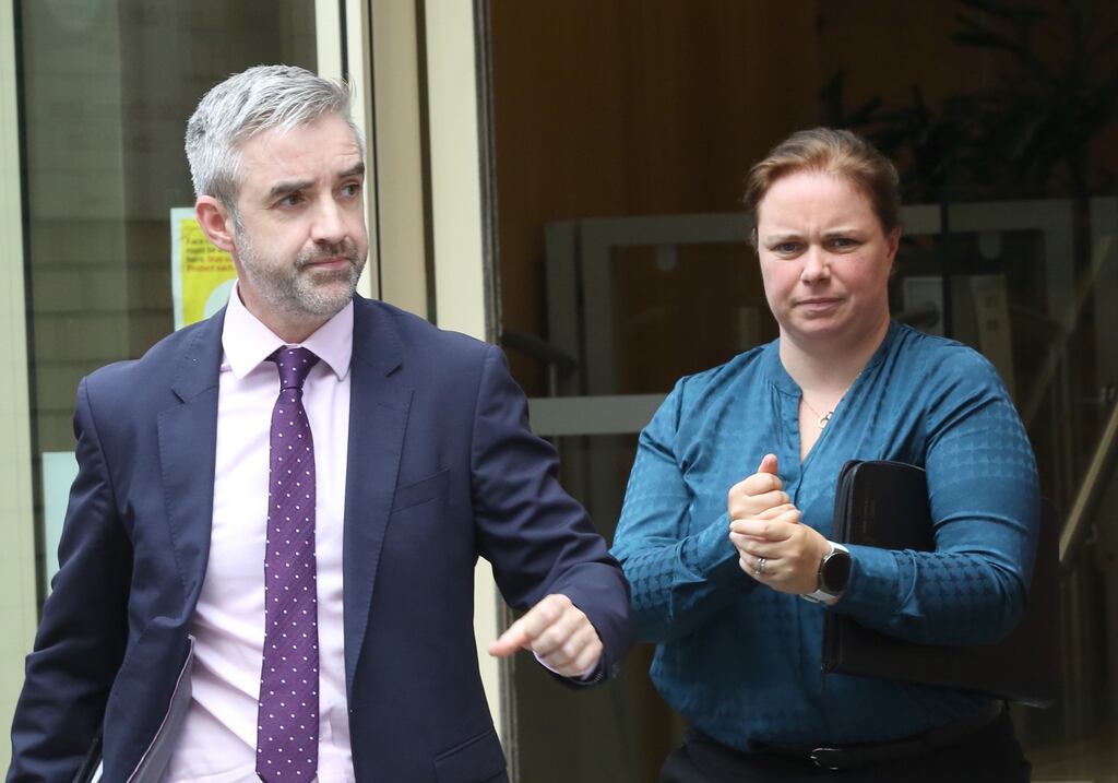 Detective Sergeant Ronan McDermott with Garda Sharon Hanley leaving the Dublin Coroner's Court on Thursday after the inquest into the death of James Griffin. Photograph: Gareth Chaney/Collins Photos