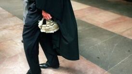 Man charged with child abuse, possession of banned book