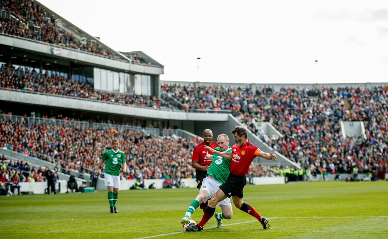 Colin Healy and Roy Keane during the Ireland Legends v Manchester United legends which formed the Liam Miller Tribute Match, at Páirc Uí Chaoimh, Cork in 2018. Photograph: James Crombie/Inpho