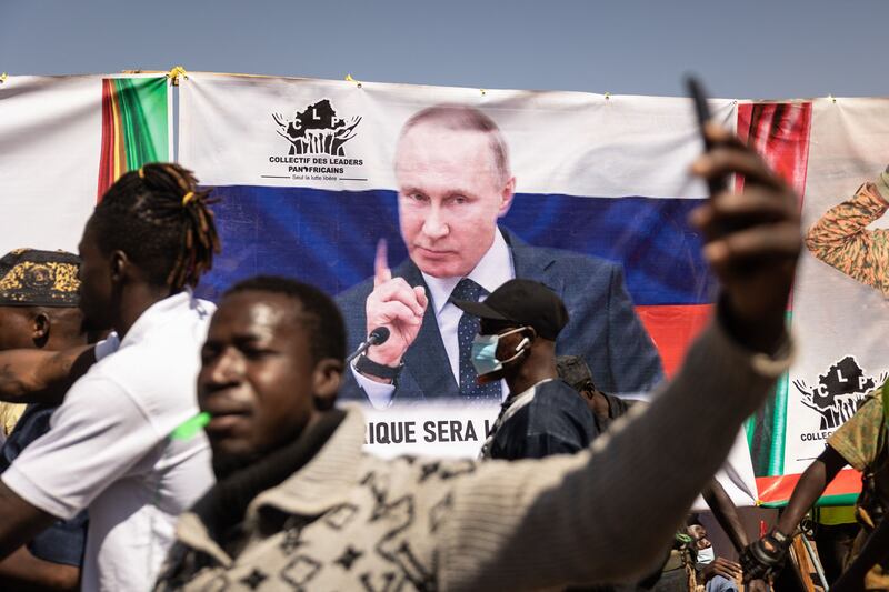 A banner with the image of Russian president Vladimir Putin during a protest to support the Burkina Faso president Ibrahim Traore.
Photograph: Olympia De Maismont /AFP via Getty Images