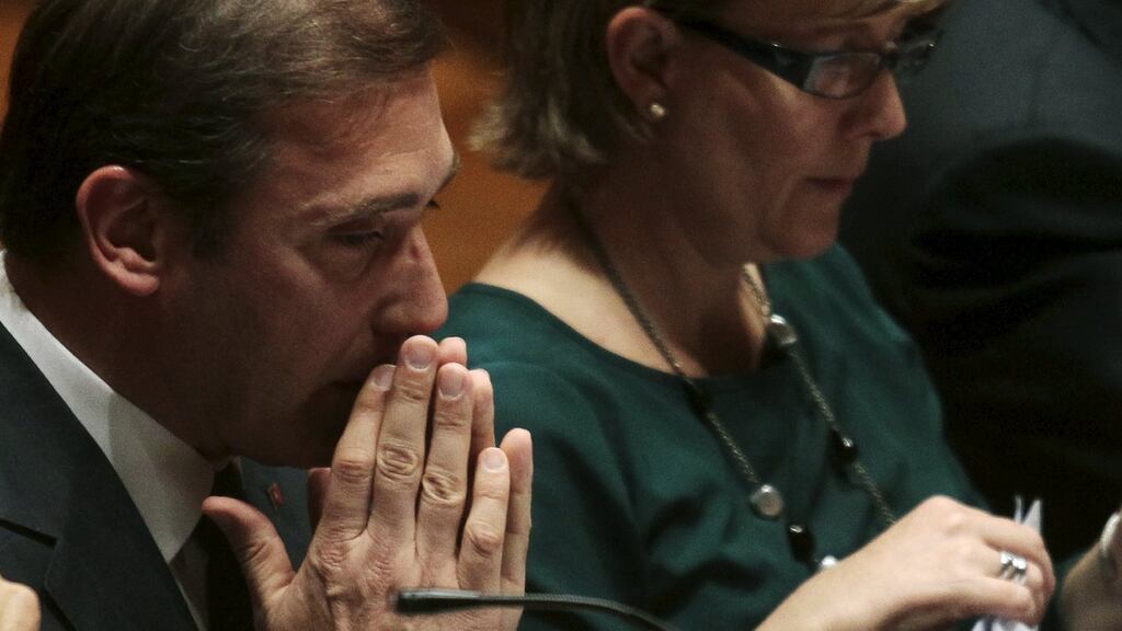Portugal’s prime minister Pedro Passos Coelho with finance minister Maria Luis Albuquerque during a debate in parliament on Monday.  Photograph: Hugo Correia/Reuters