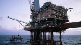 Oil hits five-year low before rallying above $62