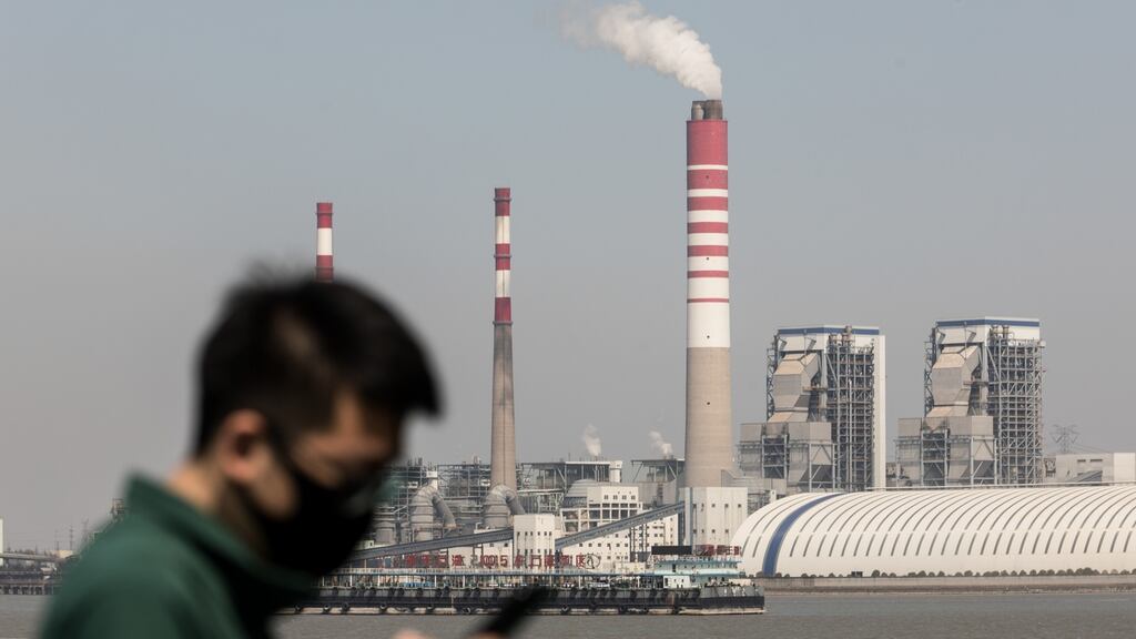 While much of the world’s output is grinding to a halt because of the coronavirus, China is slowly emerging from its shutdowns by restarting production at factories. Photograph: Qilai Shen/Bloomberg