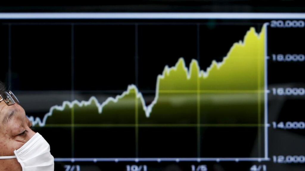 Hopes of more easy money from top central banks pushed Japan’s Nikkei index past 20,000 points for the first time in 15 years