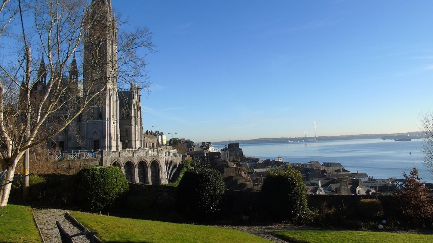 Windows in the gable end of Number 1 The Crescent look across to Cobh Cathedral