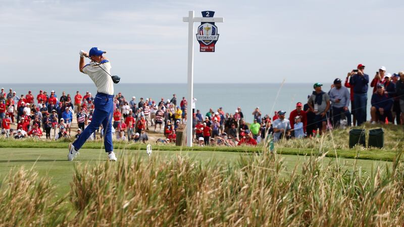 Rory McIlroy plays his shot from the second tee during Sunday’s singles matches. Photograph: Warren Little/Getty Images