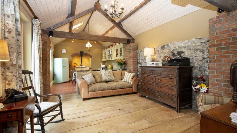 The open-plan, eat-in kitchen cum livingroom has all the tropes of country living