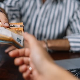 Who still uses cash and what do they use it for?