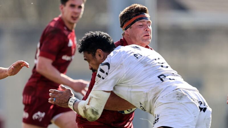 CJ Stander is tackled by Jerome Kaino. Photograph: Dan Sheridan/Inpho
