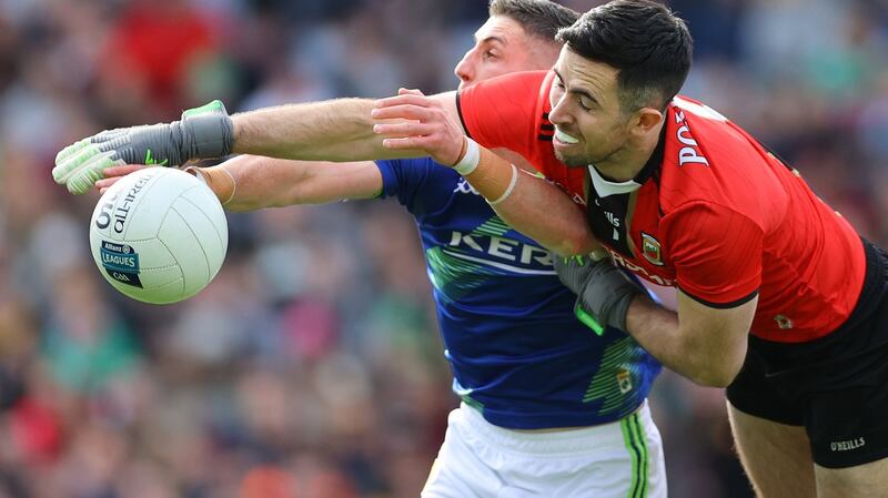 Kerry’s Paul Geaney is challenenged by Mayo goalkeeper Rory Byrne during the Allianz Football League Division One Final at Croke Park. Photograph: James Crombie/Inpho