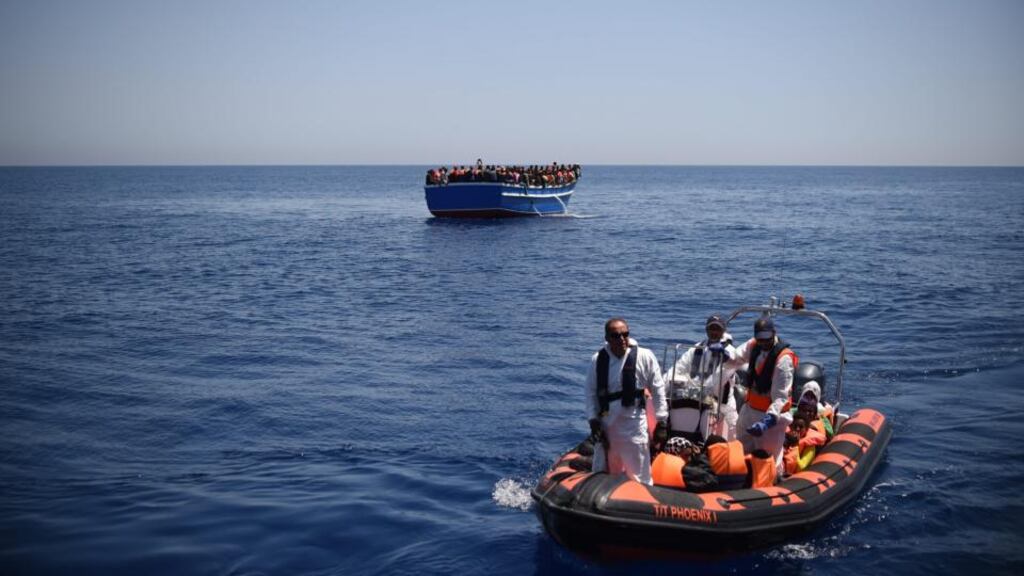 ‘There is nothing easy about deciding to make the journey to Libya, a country at war, and then to put your life at risk on an overcrowded boat in the Mediterranean Sea.’ Migrants being transferred from a wooden boat to their rescue ship MY Phoenix in the Mediterranean Sea, earlier this month. Photograph: EPA/IKRAM N’GADI/Medécins Sans Frontières