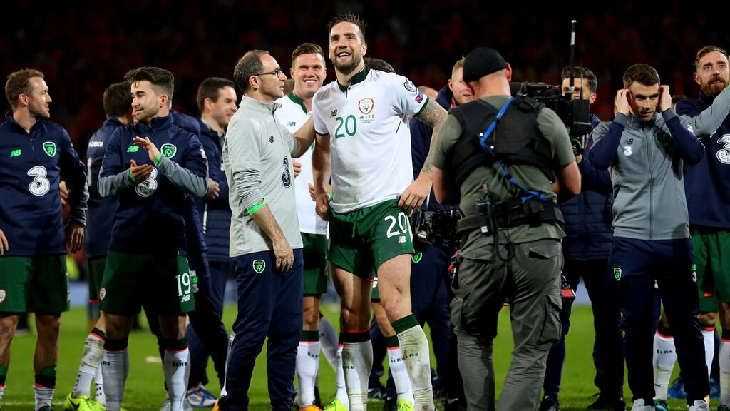 Republic of Ireland manager Martin O’Neill and Shane Duffy celebrate after the win over Wales in Cardiff. Photograph: James Crombie/Inpho