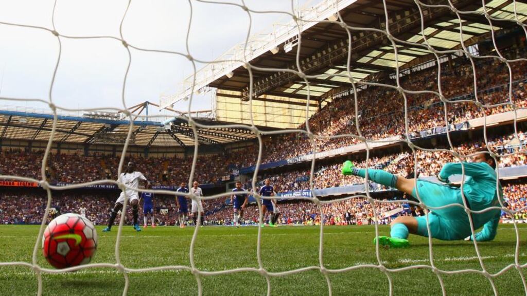 Bafetimbi Gomis of Swansea City scores his team’s second goal from the penalty spot past Asmir Begovic of Chelsea Photo: Getty Images