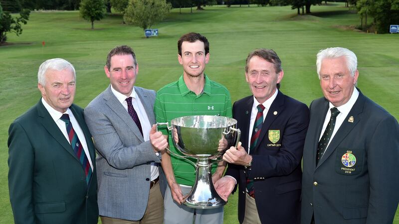 Tom Moore (Captain, Mullingar Golf Club) presenting Tiarnan McLarnon (Massereene) with the 2018 Sherry Fitzgerald Davitt & Davitt sponsored Mullingar Scratch Cup. Also in the picture (from left) are Chris Garry (President, Mullingar Golf Club), Aiden Davitt (sponsor) and John Moloughney (President, GUI). Photograph: Pat Cashman