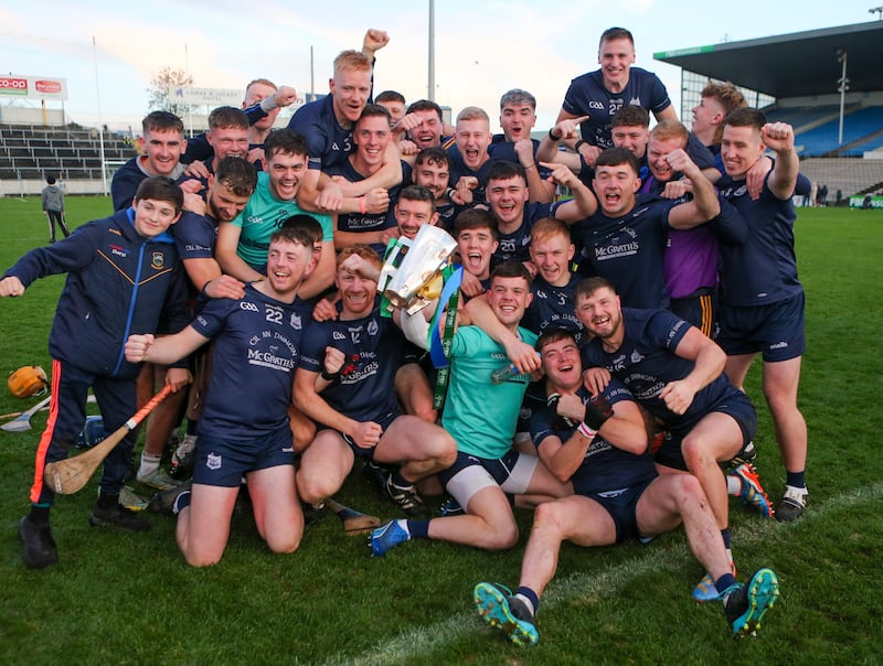 The Kildangan team celebrate with the Dan Breen Cup. Photograph: Ken Sutton/Inpho