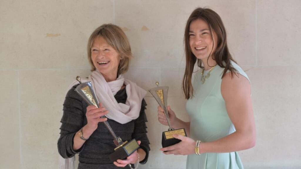 19/12/14 - NEWS - Joanna Morgan, winner of the Lifetime Achievement Award and Katie Taylor winner of the ‘Sports woman of the Year 2014’ at the 10th Annual The Irish Times/Irish Sports Council Sportswoman of the Year awards.Photograph: Alan Betson / The Irish Times