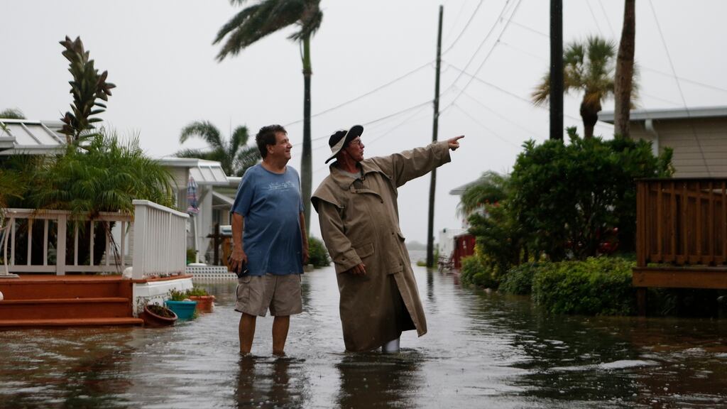 Residents of the Sandpiper Resort survey the rising water coming from the Gulf of Mexico as a result of Hurricane Hermine in Holmes Beach, Florida. Photograph: Brian Blanco/Getty Images