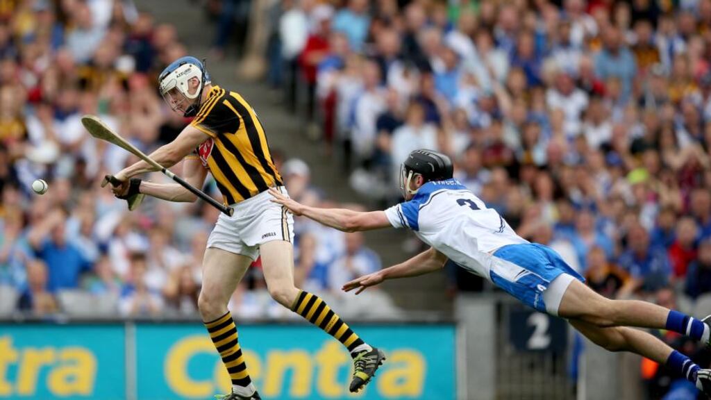 TJ Reid scores Kilkenny’s goal despite the attention of Waterford’s Barry Coughlan during the All-Ireland SHC semi-final at Croke Park. Photograph: James Crombie/Inpho