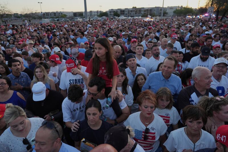 People wait in line before a memorial event for conservative activist Charlie Kirk. Photograph: AP