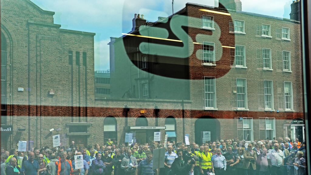 ESB workers hold a meeting to voice concerns about their pensions, on the street outside the ESB Headquarters in Dublin, as the annual general meeting takes place inside last June. Photograph: Eric Luke/The Irish Times