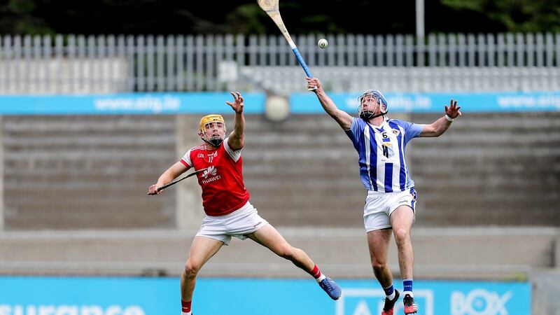 Cuala’s Diarmuid O’Floinn and Simon Lambert of the Ballyboden St Enda’s in the Dublin Senior Hurling Championship final at Parnell Park on Sunday. Photograph: Laszlo Geczo/Inpho