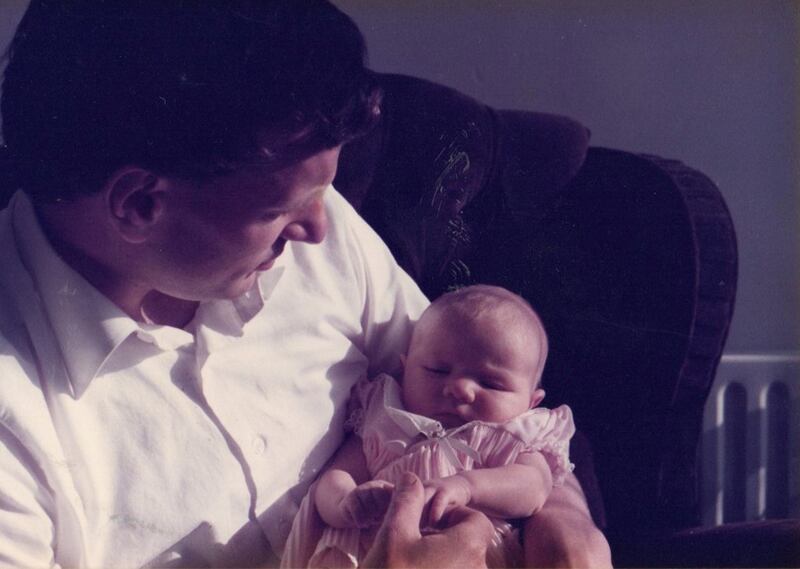 Aisling Bea's late father Brian O'Sullivan holds Aisling as a baby. Photograph: Máire Ní Shuilleabhain/ Wall To Wall/BBC