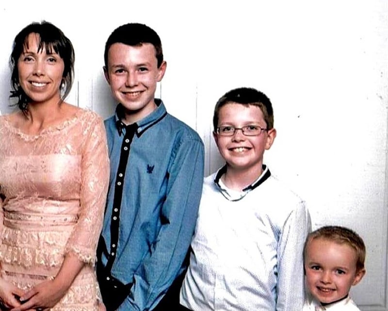 Clodagh Hawe with her children, Liam (13), Niall (11) and Ryan (6). Photograph: Hawe/Coll families/PA Wire